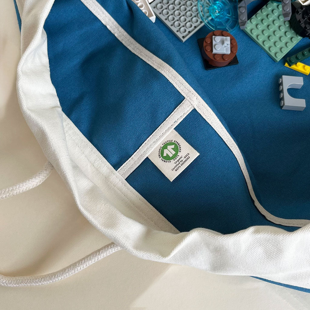 gots certified label in blue canvas swoop bag